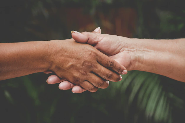 close-up-black-white-hand-handshake